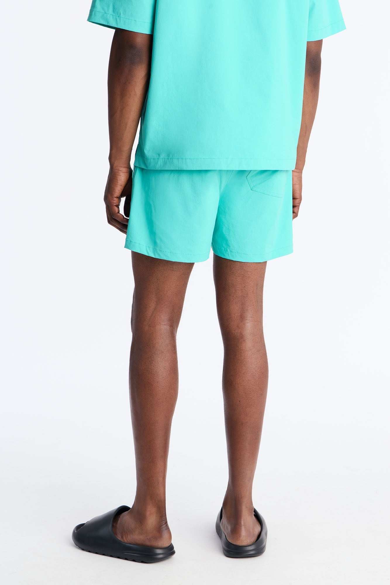 Montez Stretch Swim Trunk 4″ - Teal