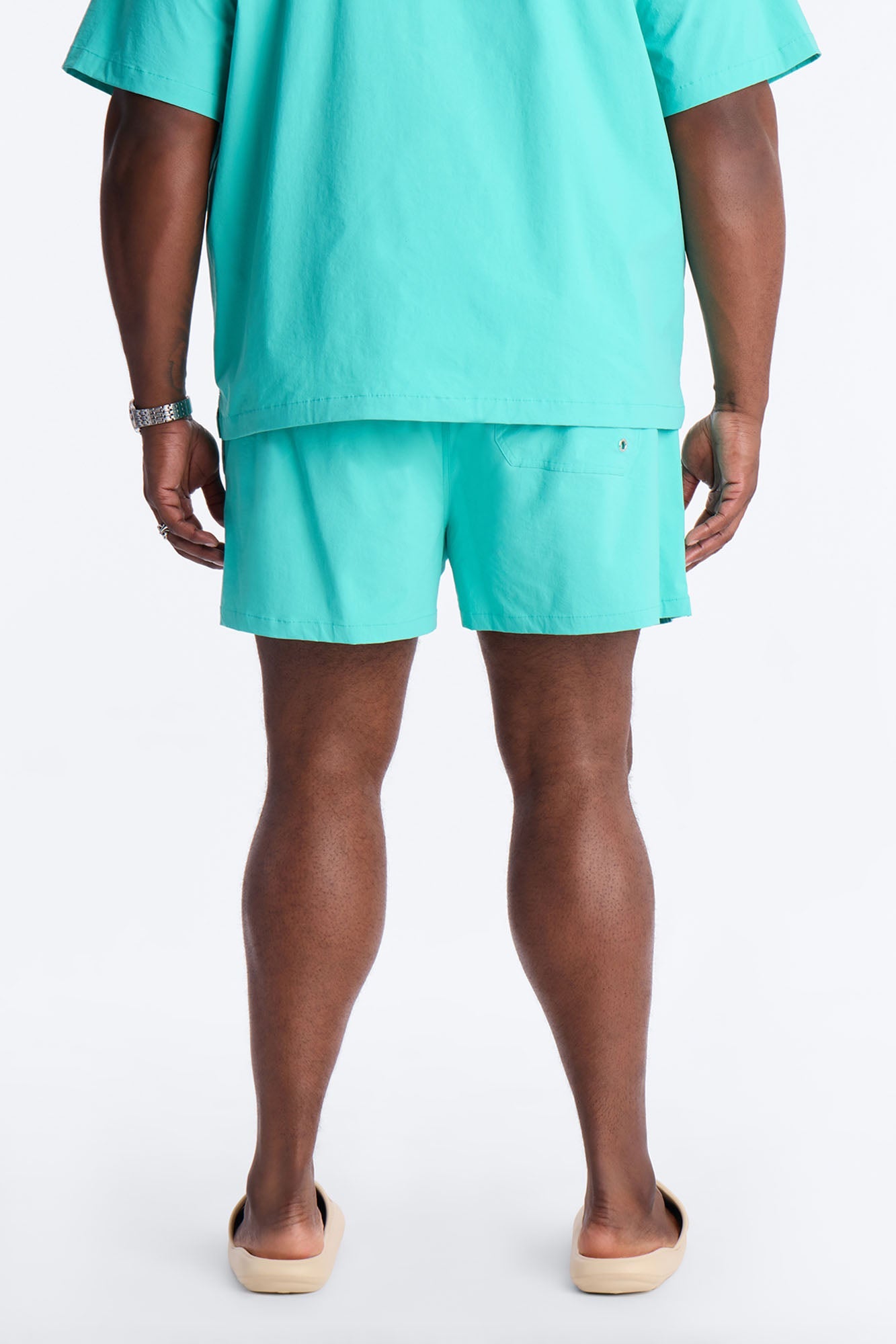 Montez Stretch Swim Trunk 4″ - Teal