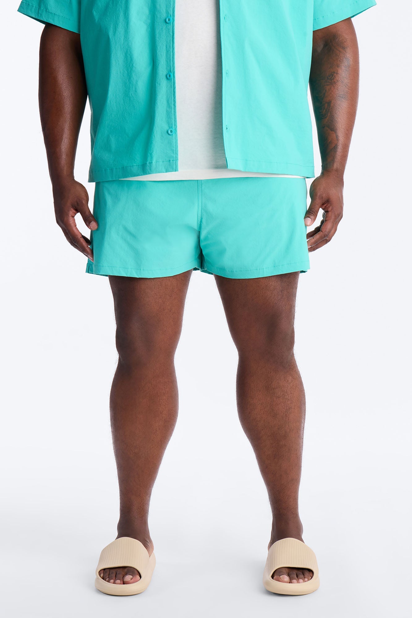 Montez Stretch Swim Trunk 4″ - Teal