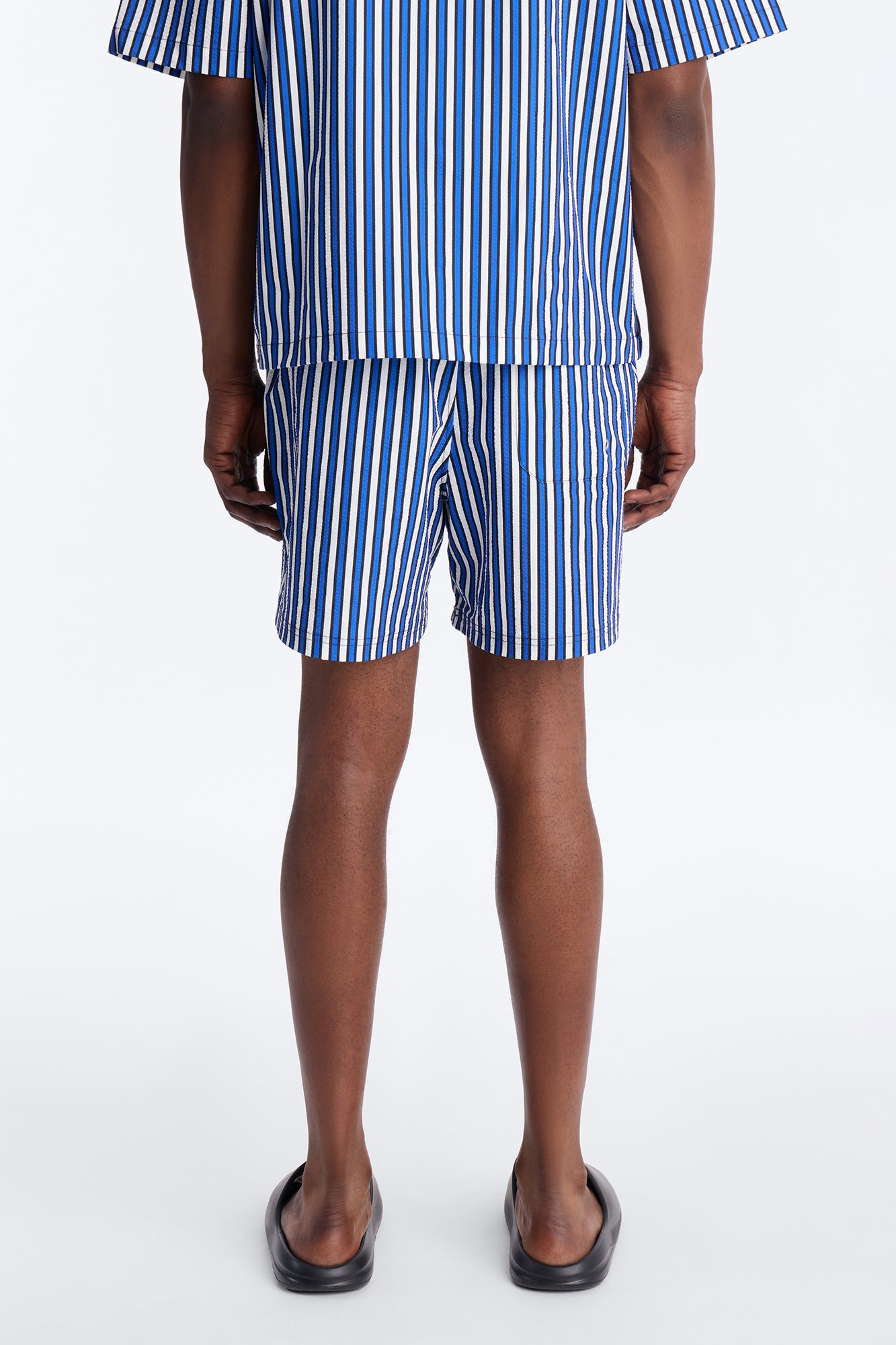 Palm Haven Striped Seersucker Swim Trunk 6″ - Blue