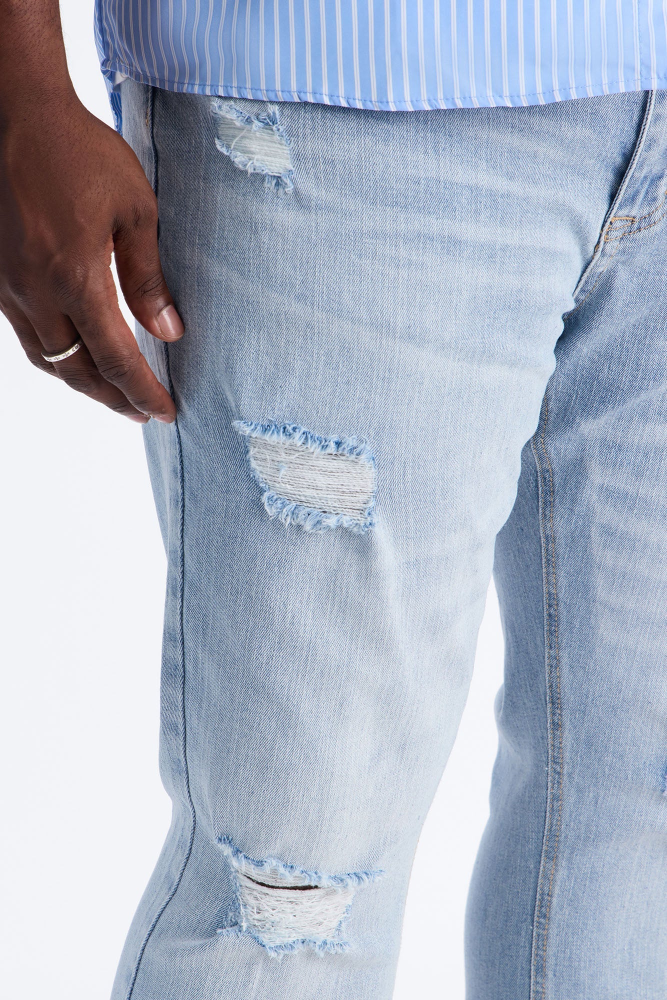 Essential Destroyed Stacked Skinny Flare Stretch Jean - Light Blue Wash