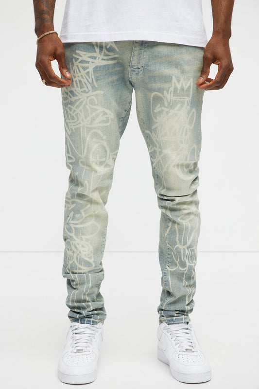 Graffiti Art Stacked Skinny Jeans - Light Wash