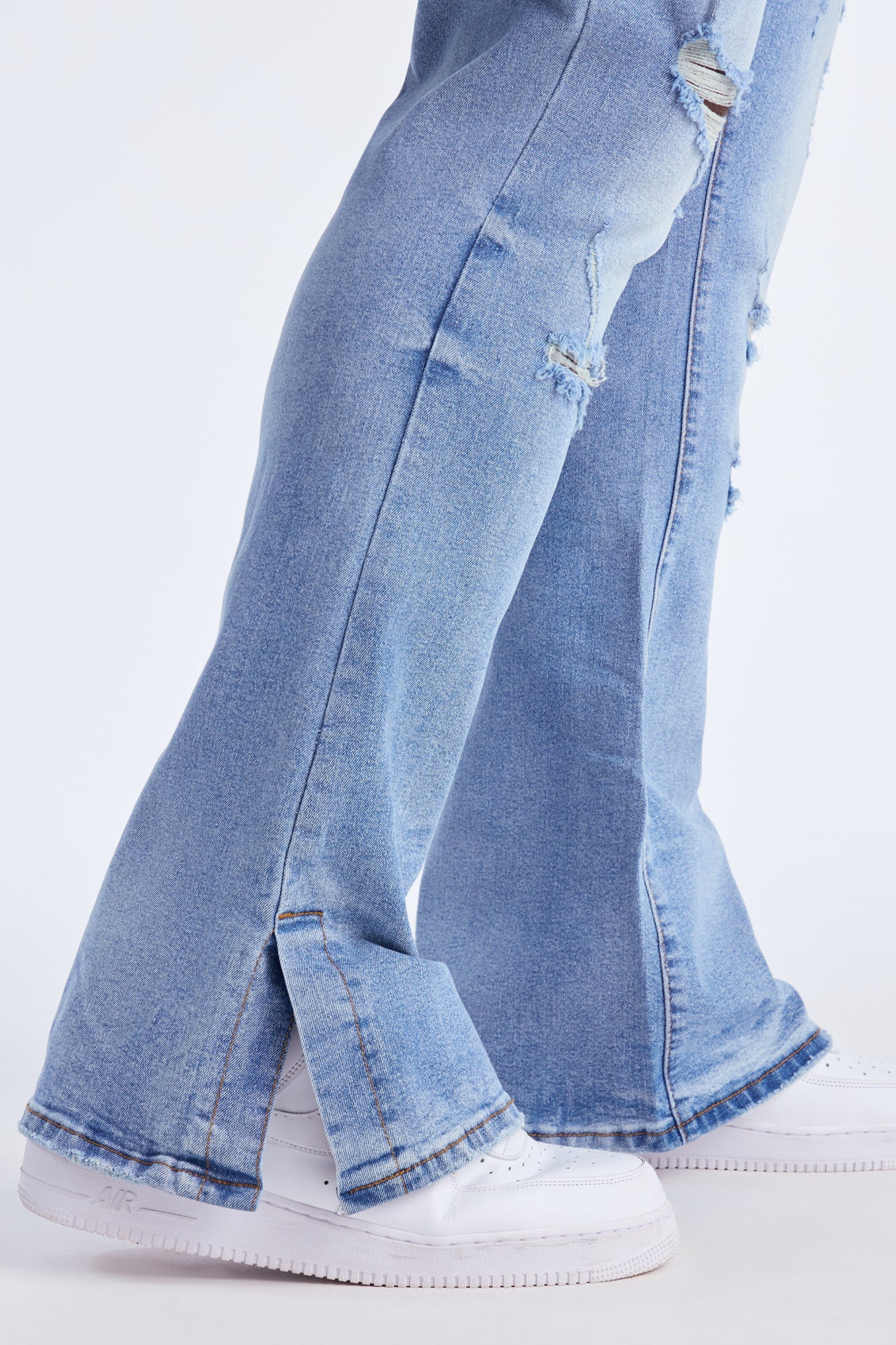 Stacked Skinny Flare Slit Rebel Against Distressed Jean - Light Wash